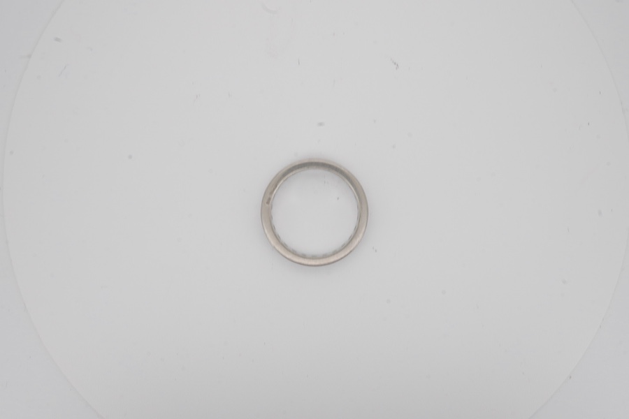 A diamond eternity ring, channel-set with a continuous band of brilliant-cut diamonds totalling approximately 1.20 carats, mounted in platinum, size P1/2, British hallmarks, Condition: good